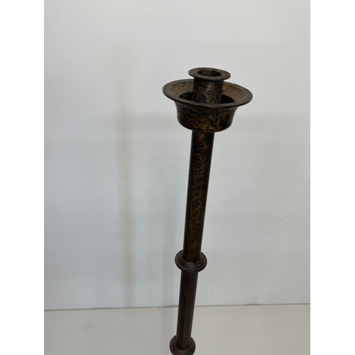 17 - A patinated brass candle stand 83 cm tall.

This lot is available for in-house shipping