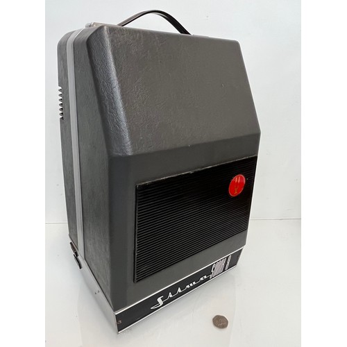 21 - A cased Sonik 8 film projector incorporating a loud speaker and microphone

This lot is available fo... 