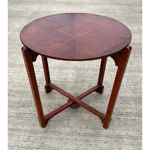 23 - Circular topped folding table

This lot is collection only.