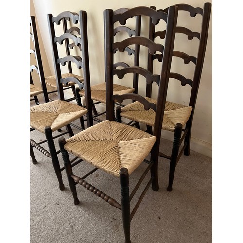 52 - Six rush seated dinning chairs.

This lot is collection only.