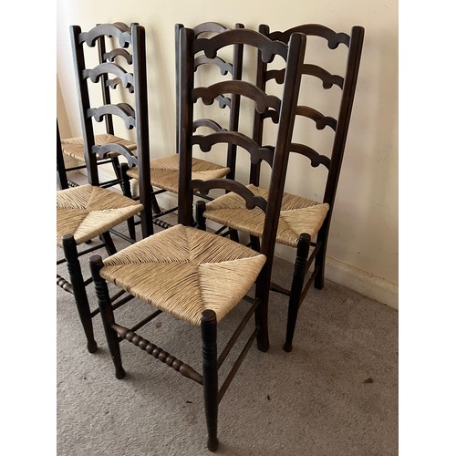 52 - Six rush seated dinning chairs.

This lot is collection only.