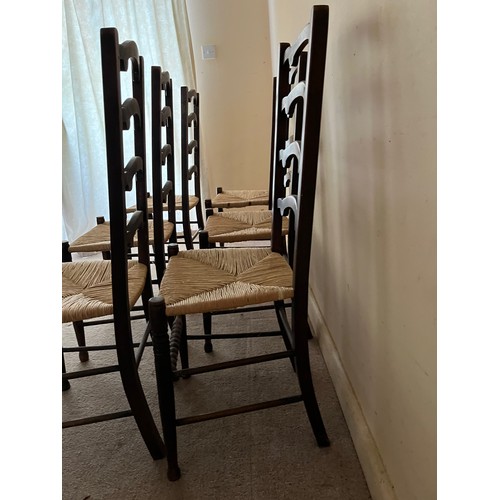 52 - Six rush seated dinning chairs.

This lot is collection only.