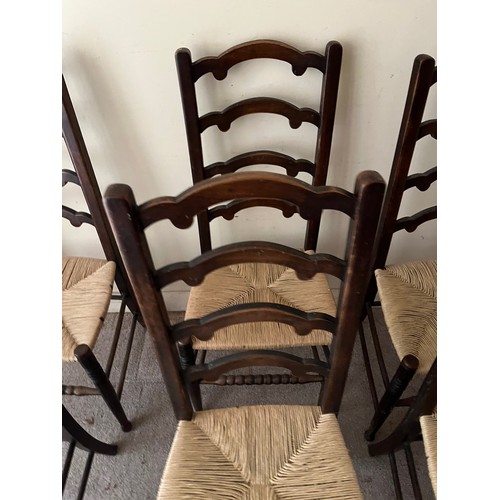 52 - Six rush seated dinning chairs.

This lot is collection only.