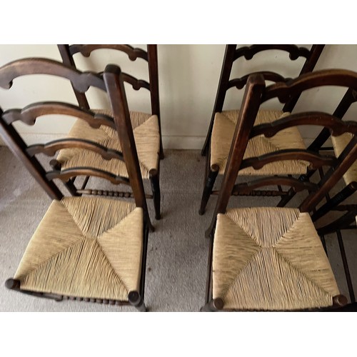 52 - Six rush seated dinning chairs.

This lot is collection only.