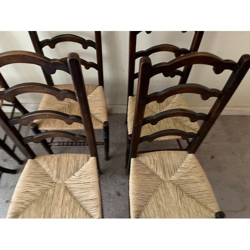 52 - Six rush seated dinning chairs.

This lot is collection only.