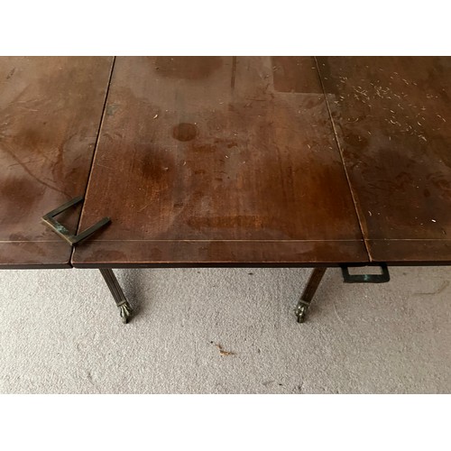 53 - Extending D end dinning table, single extension leaf.

This lot is collection only.