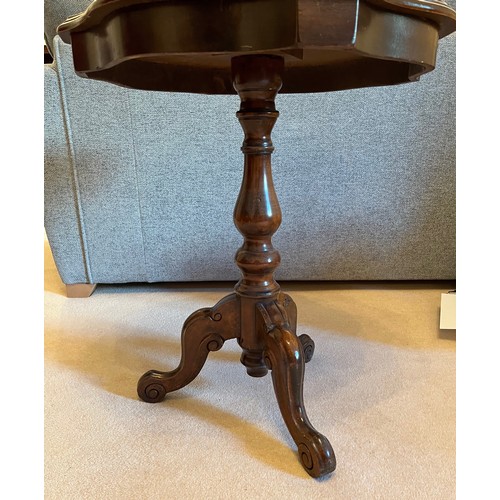 58 - Inlaid side table raised on a single column support with three feet. 54 cm wide and 63 cm tall.

Thi... 