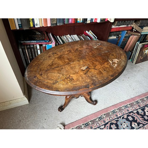 63 - Oval topped side table with inlaid decoration.

This lot is collection only.