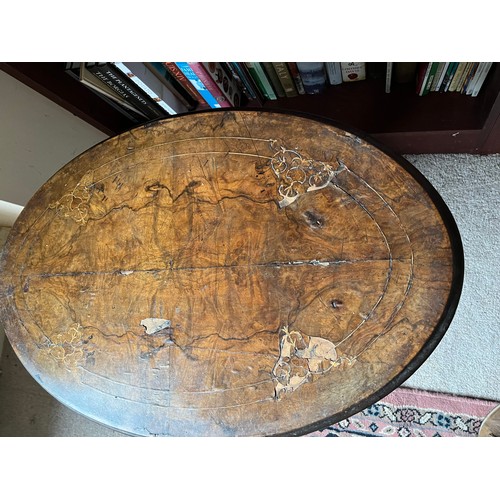 63 - Oval topped side table with inlaid decoration.

This lot is collection only.