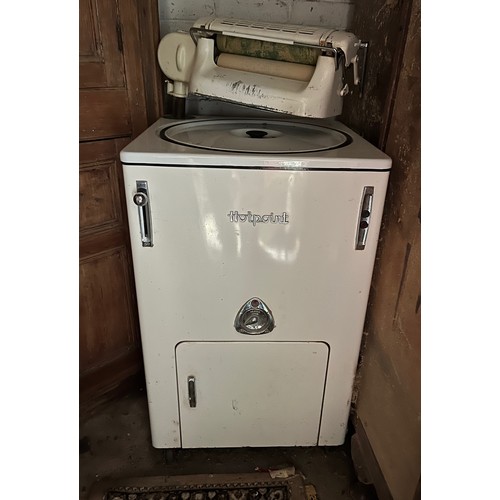 153 - A white enamelled Hotpoint washing machine and mangle.

This lot is collection only.