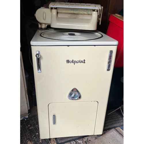 154 - A cream enamelled Hotpoint washing machine and mangle.

This lot is collection only.