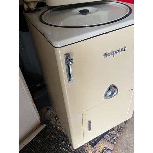 154 - A cream enamelled Hotpoint washing machine and mangle.

This lot is collection only.