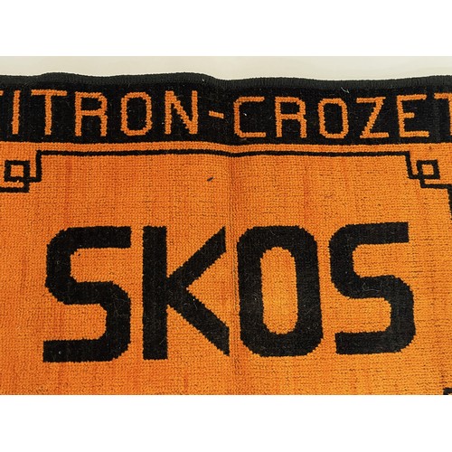161 - A woven tapestry mat adverting Citron – Crozet, 71 cm x 51 cm.

This lot is available for in-house s... 