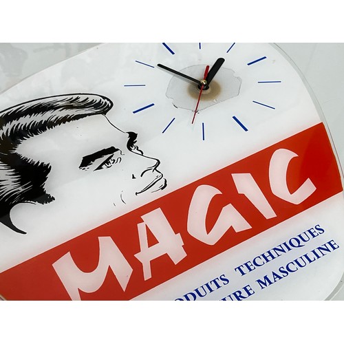 162 - Hair salon wall clock advertising Magic brand of male grooming products. 34 cm x 34 cm.

This lot is... 