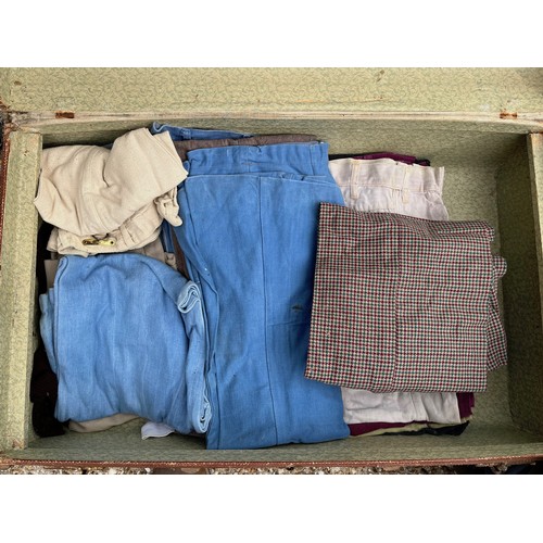164 - Trunk of clothing, old bell bottom jeans etc.

This lot is collection only