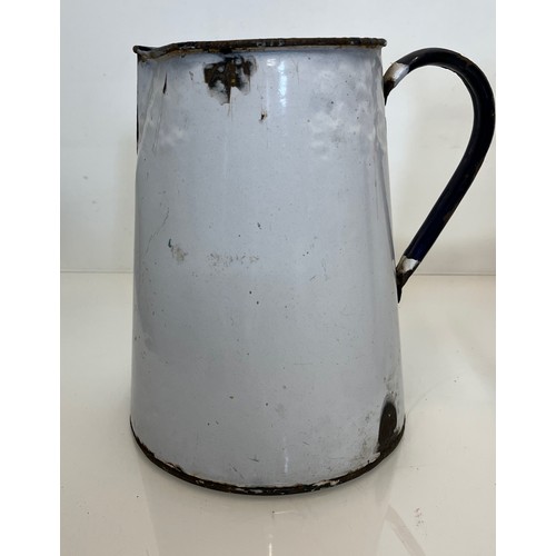 168 - Two vitrous enamels jugs. 28 cm tall and 23cm tall.

This lot is available for in-house shipping