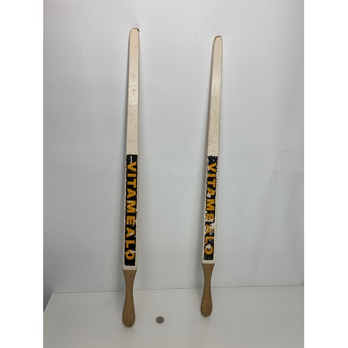 170 - Two branded advertising sticks for controlling show pigs in a ring, 92 cm long.

This lot is availab... 