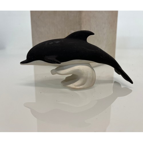 182 - A boxed Highbank porcelain figurine of a Dolphin.

This lot is available for in-house shipping