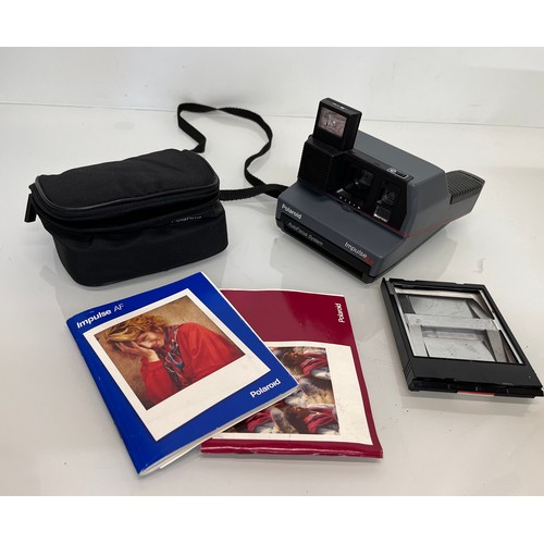 184 - Polaroid Impulse AF instant camera

This lot is available for in-house shipping