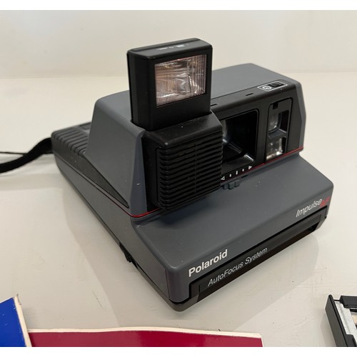 184 - Polaroid Impulse AF instant camera

This lot is available for in-house shipping