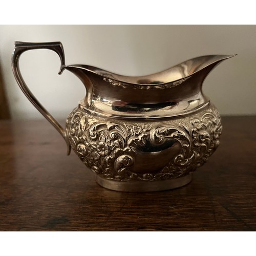 185 - Plated tea pot, milk jug and sugar bowl with embossed decoration.

This lot is available for in-hous... 