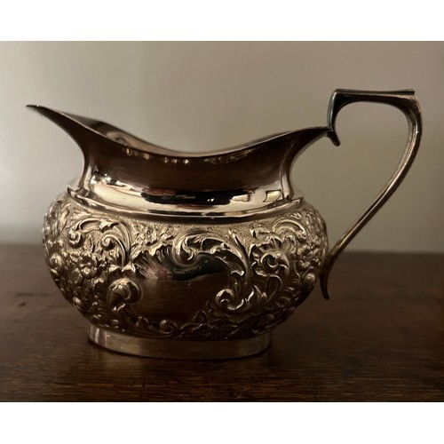 185 - Plated tea pot, milk jug and sugar bowl with embossed decoration.

This lot is available for in-hous... 