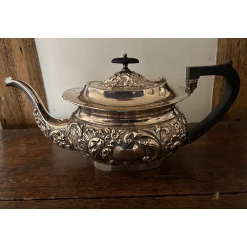 185 - Plated tea pot, milk jug and sugar bowl with embossed decoration.

This lot is available for in-hous... 