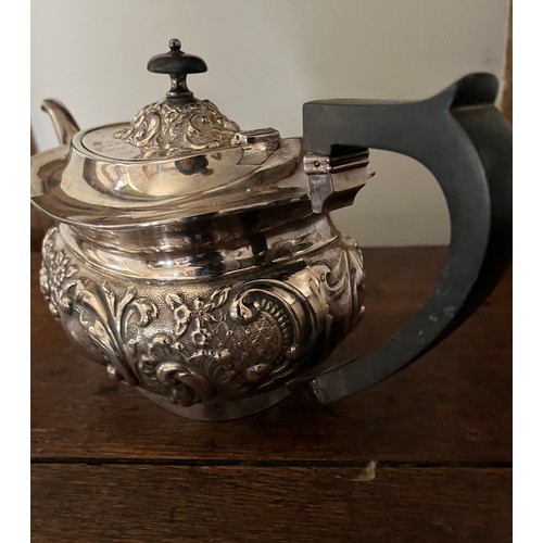 185 - Plated tea pot, milk jug and sugar bowl with embossed decoration.

This lot is available for in-hous... 