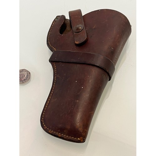 193 - A quality leather holster for a pistol by HH Heiser of Denver USA,  22 cm x 13 cm.

This lot is avai... 