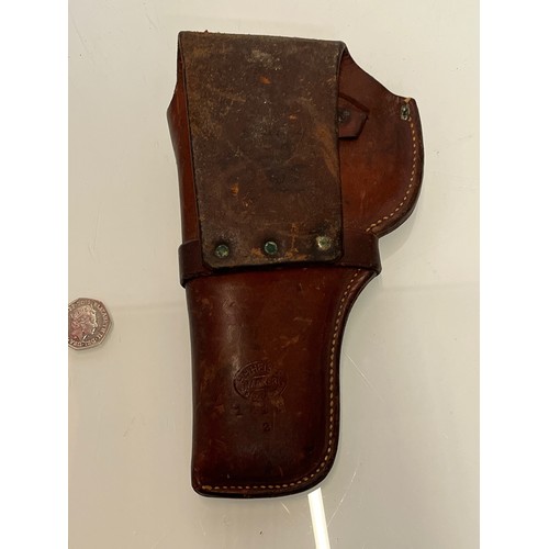 193 - A quality leather holster for a pistol by HH Heiser of Denver USA,  22 cm x 13 cm.

This lot is avai... 