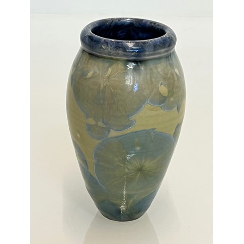 194 - Unusual small vase with an iridescent blue lustre glaze to the interior.

This lot is available for ... 