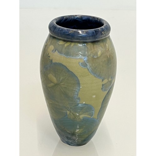 194 - Unusual small vase with an iridescent blue lustre glaze to the interior.

This lot is available for ... 