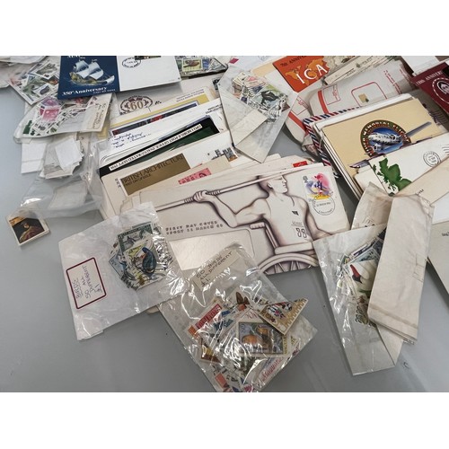 198 - A collection of Stamps and ephemera, first day covers etc.

This lot is available for in-house shipp... 