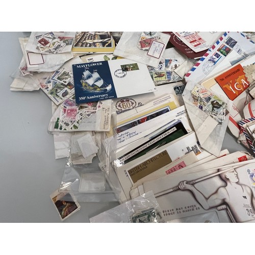 198 - A collection of Stamps and ephemera, first day covers etc.

This lot is available for in-house shipp... 