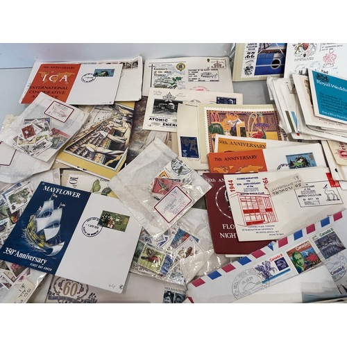 198 - A collection of Stamps and ephemera, first day covers etc.

This lot is available for in-house shipp... 