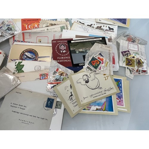 198 - A collection of Stamps and ephemera, first day covers etc.

This lot is available for in-house shipp... 