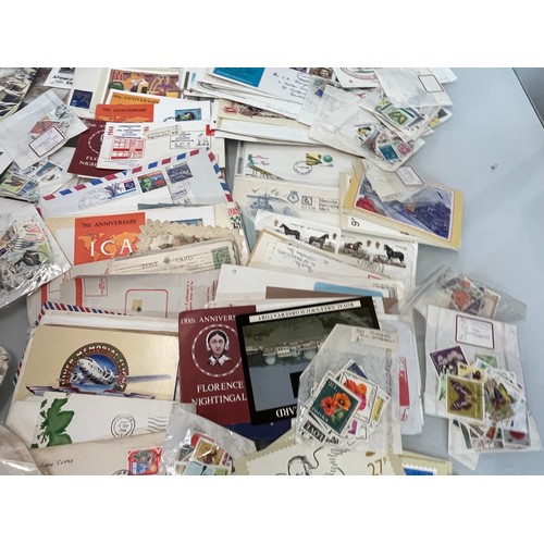 198 - A collection of Stamps and ephemera, first day covers etc.

This lot is available for in-house shipp... 