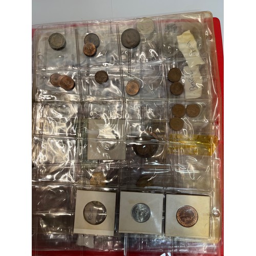 200 - Two albums of coins.

This lot is available for in-house shipping