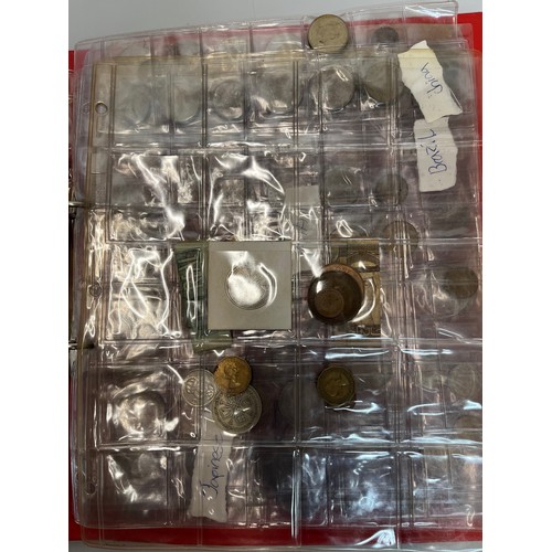 200 - Two albums of coins.

This lot is available for in-house shipping