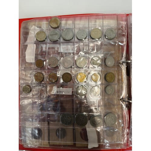 200 - Two albums of coins.

This lot is available for in-house shipping