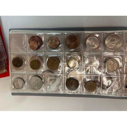 200 - Two albums of coins.

This lot is available for in-house shipping