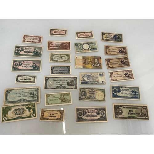 202 - A collection of post war Japanese bank notes etc.

This lot is available for in-house shipping