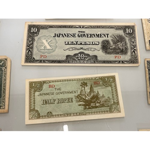 202 - A collection of post war Japanese bank notes etc.

This lot is available for in-house shipping