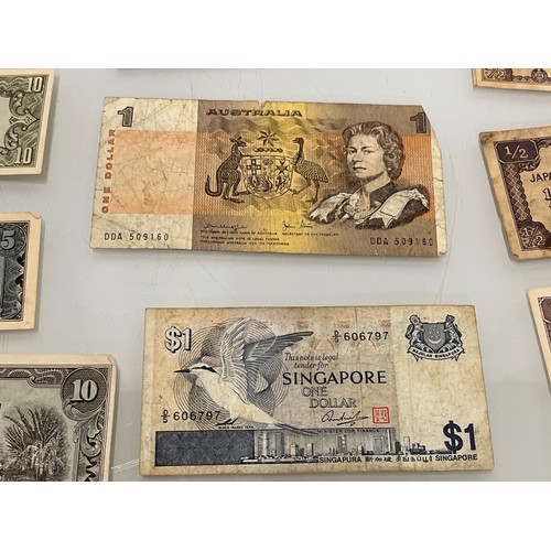 202 - A collection of post war Japanese bank notes etc.

This lot is available for in-house shipping