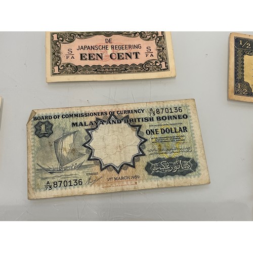 202 - A collection of post war Japanese bank notes etc.

This lot is available for in-house shipping