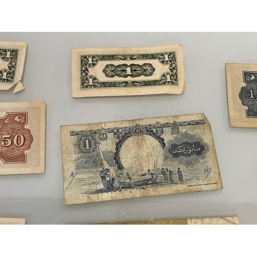 202 - A collection of post war Japanese bank notes etc.

This lot is available for in-house shipping