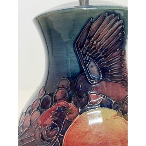 203 - A Moorcroft pottery lamp base 35 cm tall.

This lot is available for in-house shipping