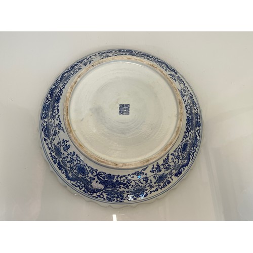 204 - Oriental bowl decorated with Dragons. 40 cm in diameter.

This lot is available for in-house shippin... 