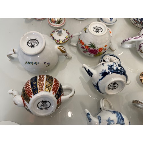 443 - A collection of twelve decorative tea pots, Spode, V & A collection, Coalport etc.

This lot is avai... 