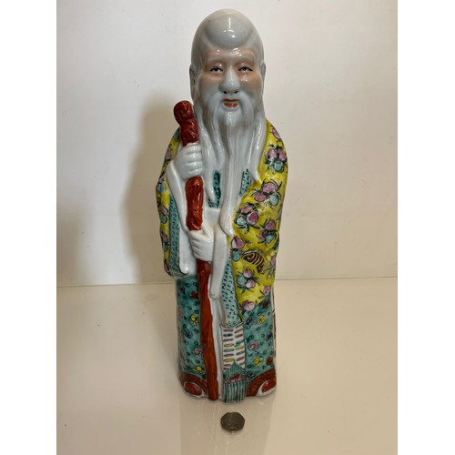 446 - Chinese ceramics, a famile rose figure of Shou Lao God of Longevity, 42 cm high.

This lot is availa... 